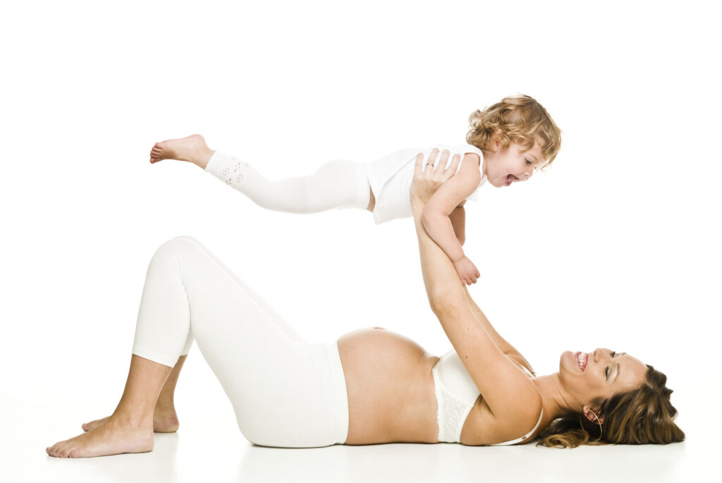 Pregnancy and Your Hand | Action Rehab - Shoulder, Elbow, Wrist and Hand Physiotherapists Pregnant Woman With Her Baby